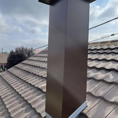 Après habillage cheminée aluminium